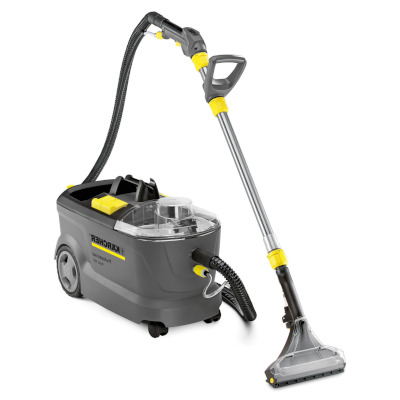 Upholstery and carpet cleaning machine